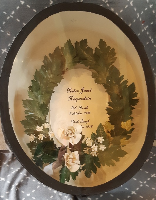 De gerestaureerde trommel en krans